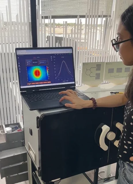 Engineering student Imane Khaloufi measuring a patch antenna with EMBox Lab